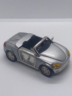 Timex Silver Convertible Car Clock with Yellow Headlight Accents